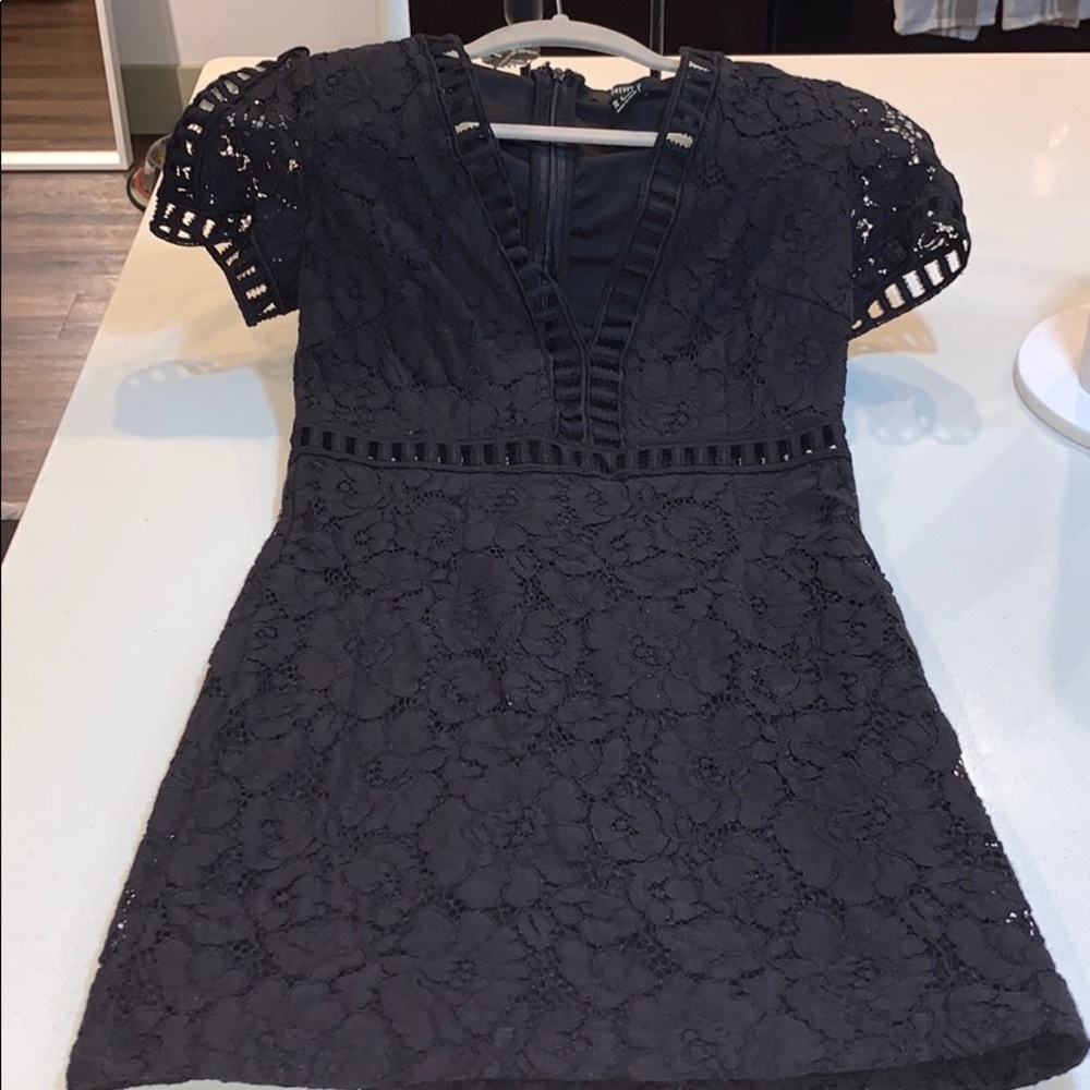 Never worn classy lace dress with beautiful detail